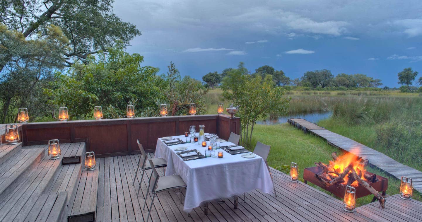 Enjoy Dinner at the Boma in Xudum Okavango Delta Lodge