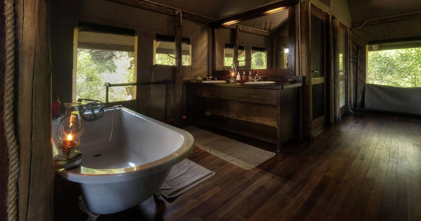 Little Kwara Camp Bathroom in  Okavango Delta