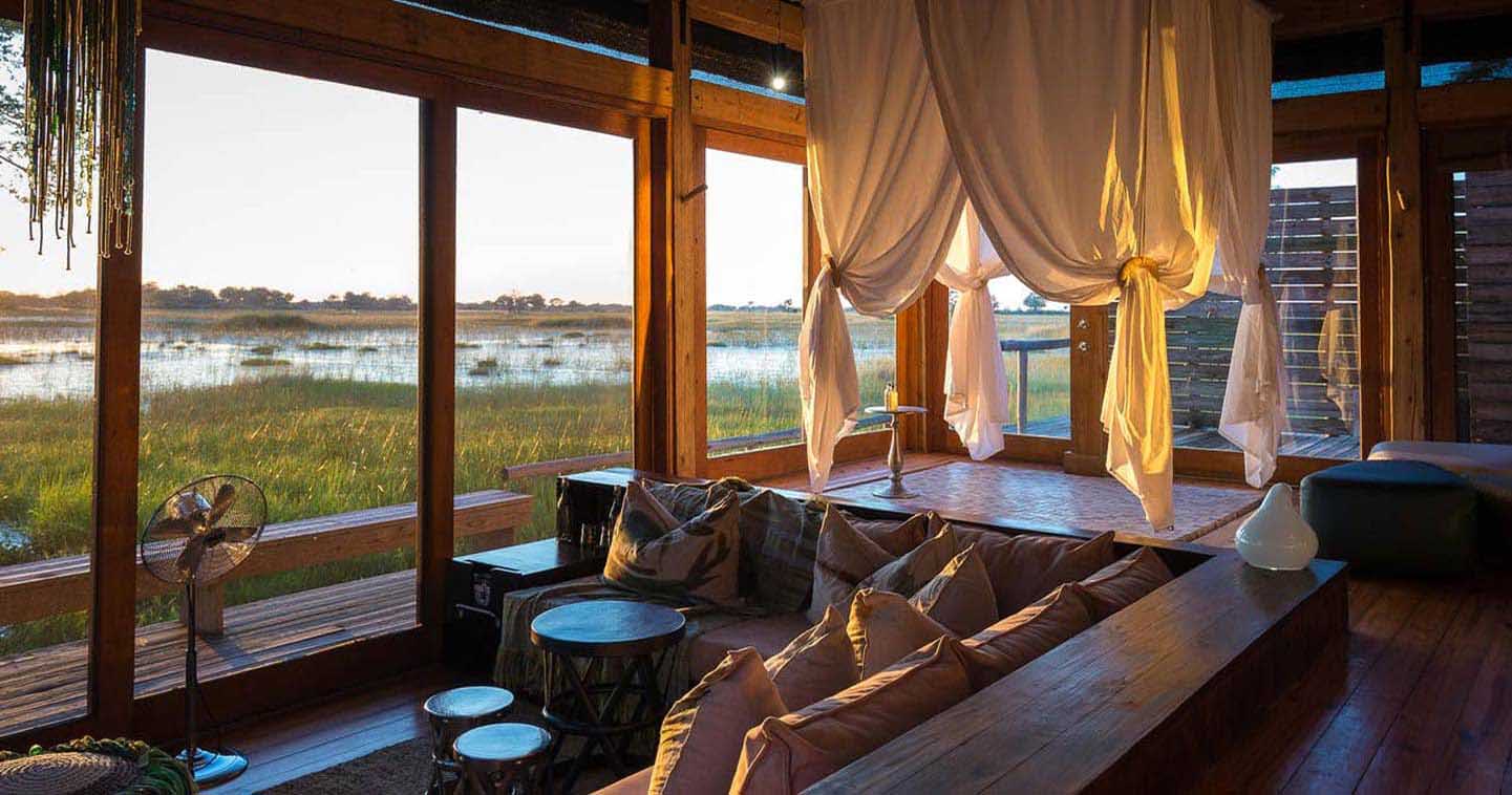 View from the Lounge at Vumbura Plains Camp over the Surrounding Bush