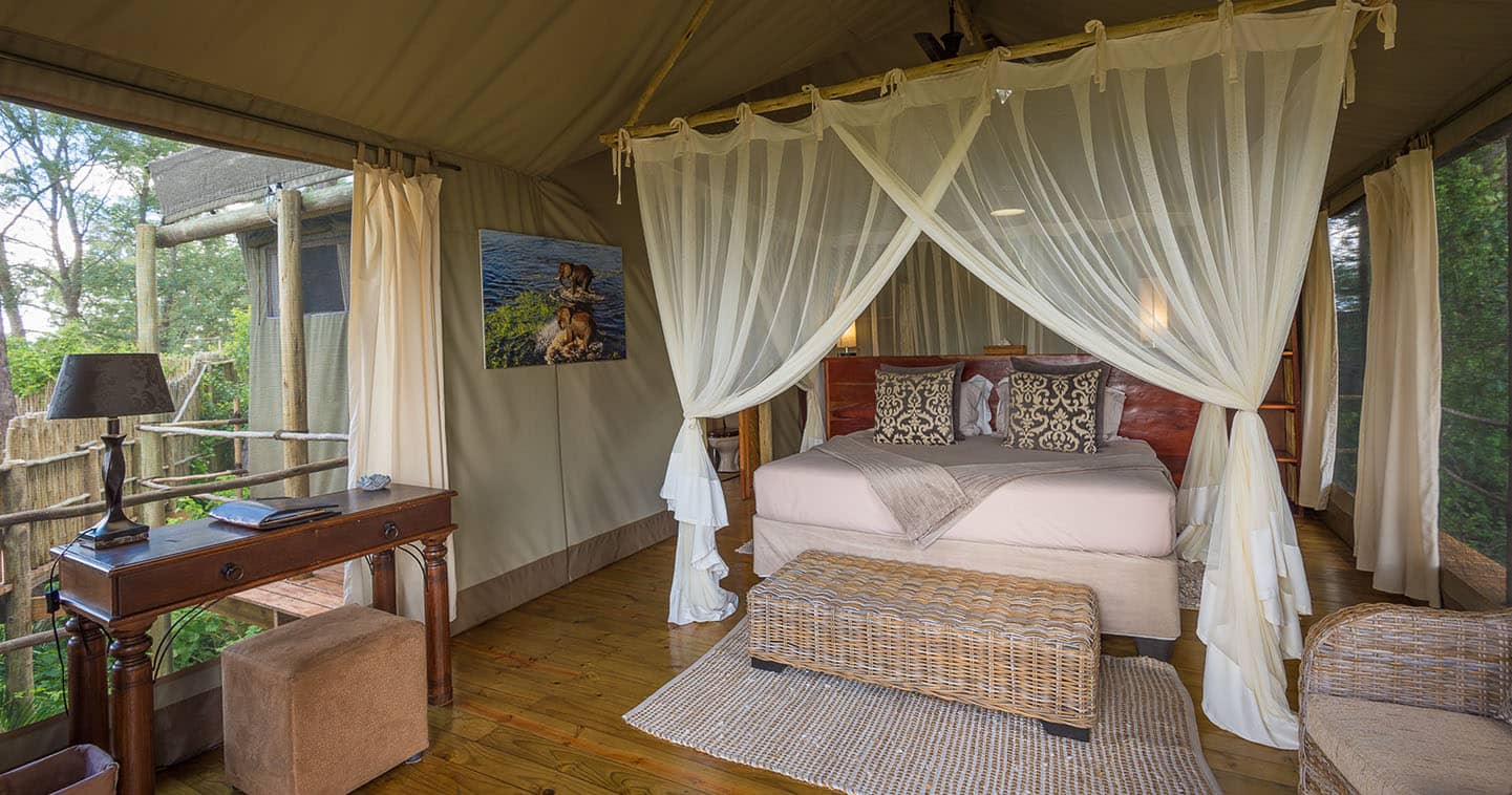 Enjoy the luxury bedroom at Jacana Tented Camp